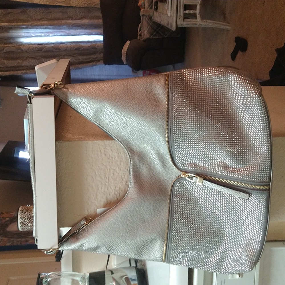 Brand new silver with sequence purse
